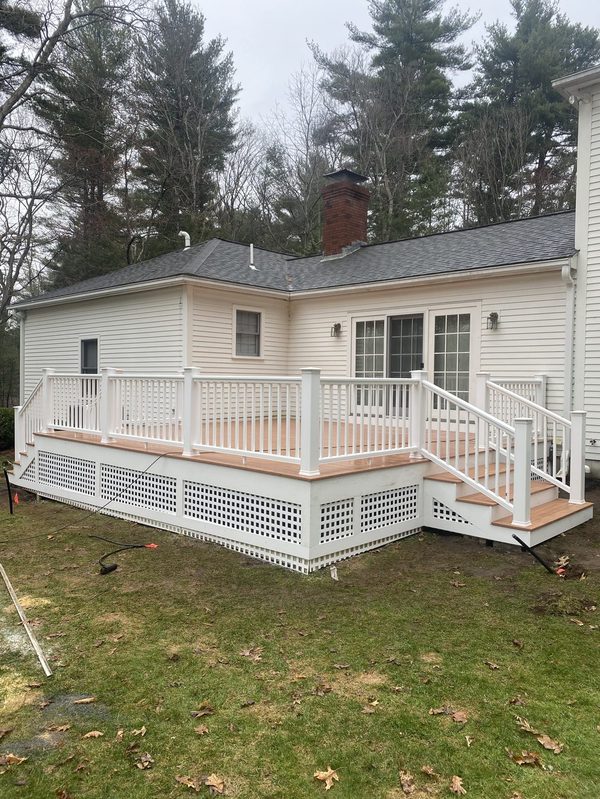 New composite deck build with white railing — Crafted Edge Carpentry, Cambridge MA