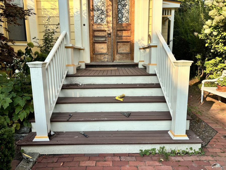 Before: porch stairs with peeling paint — Crafted Edge Construction